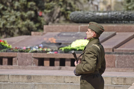 VOLGOGRAD - APRIL 25 Soldiers of  honor guard with a gun in his hand shall be on duty at eternal...