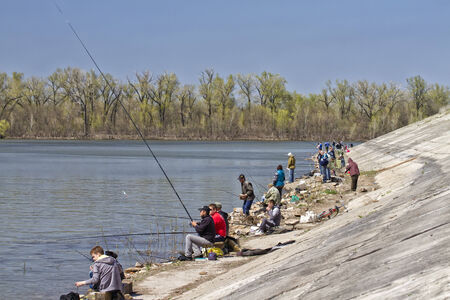 VOLGOGRAD - APRIL 27  Fishermens catch fish at entrance to the Volga-don navigation canal   April 27, 2014 in Volgograd, Russia In first warm spring weekend residents of city opened fishing season のeditorial素材