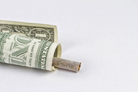 Smoking is the emission of moneyの写真素材