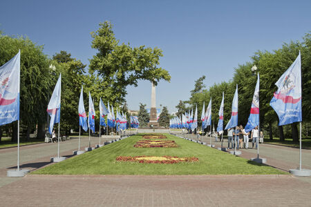 VOLGOGRAD - SEPTEMBER 6:Decorated with flags and lots of tulips the Alley of Heroes on the celebration of the city day . September 6, 2014 in Volgograd, Russia.のeditorial素材