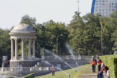 VOLGOGRAD - SEPTEMBER 6: Watering the lawn on the main promenade of the city. September 6, 2014 in Volgograd, Russia.のeditorial素材