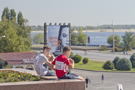 VOLGOGRAD - SEPTEMBER 6:Young men participants in the annual race \"Volgograd mile awaiting the start of the competition . September 6, 2014 in Volgograd, Russia.のeditorial素材