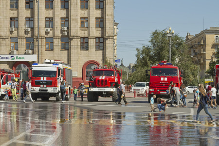 VOLGOGRAD - SEPTEMBER 6: Fire engines at the exhibition stand under the open sky on the forecourt of Volgograd.. September 6, 2014 in Volgograd, Russia.のeditorial素材