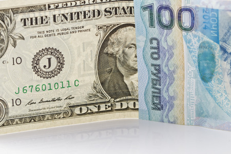 One dollar bill, one hundred rubles Sochiの写真素材