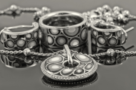 Set of silver jewelry : ring, earrings and pendanの写真素材