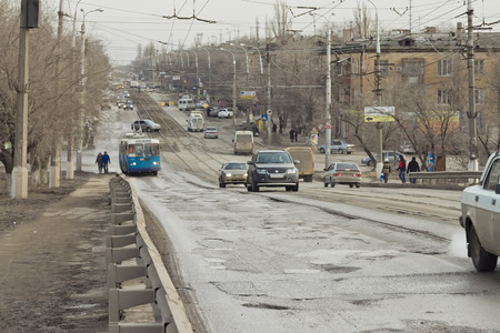 VOLGOGRAD - FEBRUARY 07: Terrible pavement or the lifting bridge. All asphalt in the pits. February 07, 2015 in Volgograd, Russia.のeditorial素材