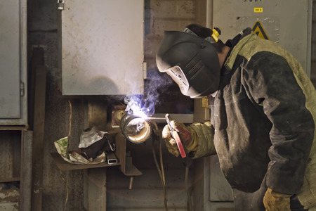 welder weld the coil-sample for confirmation of their professional skillsの写真素材