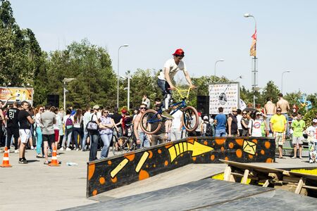 VOLGOGRAD - MAY 24: The BMX cyclist performs a stunt jump. The fifth annual competition for the Cup of Europe city Mall . May 24, 2015 in Volgograd, Russia.のeditorial素材