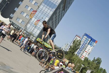 VOLGOGRAD - MAY 24: The BMX cyclist performs a stunt jump. The fifth annual competition for the Cup of Europe city Mall . May 24, 2015 in Volgograd, Russia.のeditorial素材