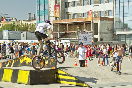 VOLGOGRAD - MAY 24: The BMX cyclist performs a stunt on the ramp. The fifth annual competition for the Cup of Europe city Mall. May 24, 2015 in Volgograd, Russia.のeditorial素材