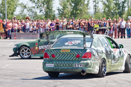 VOLGOGRAD - JUNE 6:DRIFT team Round-X â best auto pilots and stuntmen of Russia "Thank you for the victory!", dedicated to the 70th anniversary of the Victory. June 6, 2015 in Volgograd, Russia.のeditorial素材