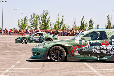 VOLGOGRAD - JUNE 6:DRIFT team Round-X â best auto pilots and stuntmen of Russia "Thank you for the victory!", dedicated to the 70th anniversary of the Victory. June 6, 2015 in Volgograd, Russia.のeditorial素材
