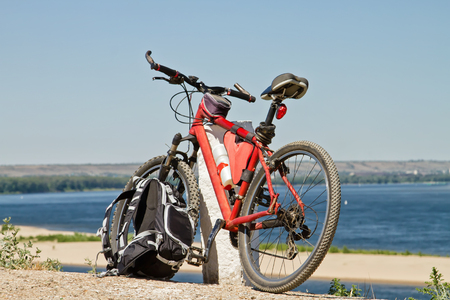 Mountain bike and backpack for photographic equipmentの写真素材