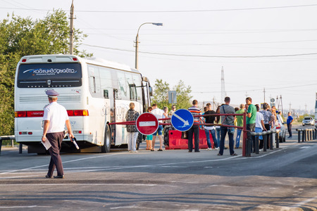 VOLGOGRAD - AUGUST 10: Thorough passport control all intercity buses, the post of police at the entrance to the city . August 9, 2015 in Volgograd, Russia.のeditorial素材