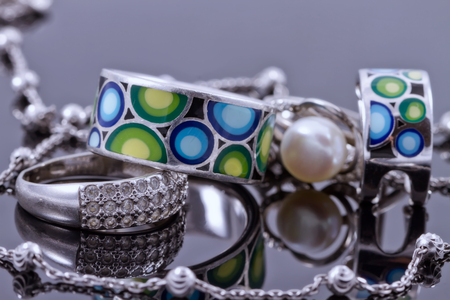 engagement silver ring with precious stones and fine silver chainの写真素材
