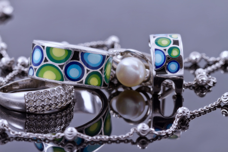 engagement silver ring with precious stones and fine silver chainの写真素材
