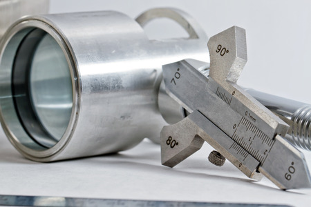Templates for measuring the bevel edge during the preparation of the welded joints, measuring the height of the reinforcement bead and fillet weld leg are on the detail drawingの写真素材