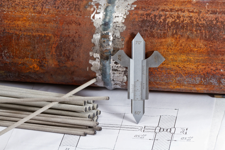 Welding electrodes are either side of a sketch made as a model and template for visually measuring controlの写真素材