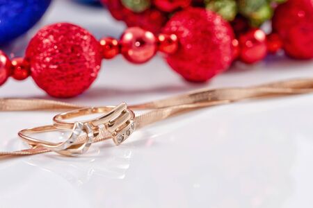 Decorations for Christmas trees,  gold chain snake netting and gold ringsの写真素材
