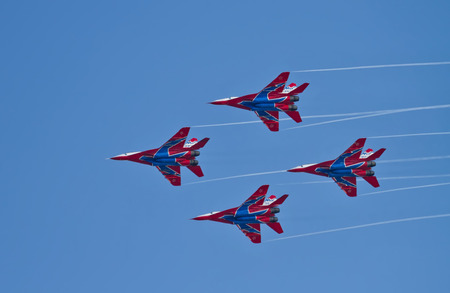 VOLGOGRAD - JANUARY 30: Demonstration performance of aviation group of aerobatics Military-air forces of Russia "Strizhi". January 30, 2016 in Volgograd, Russia.のeditorial素材