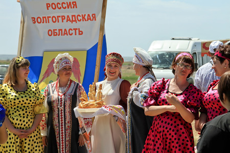 SMALL CHAPURNIKI, VOLGOGRAD, RUSSIA - MAY 24: Representatives of the Volgograd region the all-Russian Rural Sabantuy in national costumes. May 24, 2014 in Volgograd, Russia.のeditorial素材