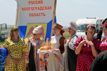 SMALL CHAPURNIKI, VOLGOGRAD, RUSSIA - MAY 24: Representatives of the Volgograd region the all-Russian Rural Sabantuy in national costumes. May 24, 2014 in Volgograd, Russia.のeditorial素材