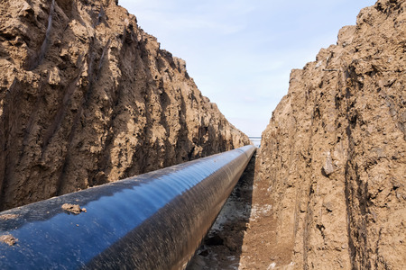 pipeline is in the protective insulation laid on the bottom of the trench dugの写真素材
