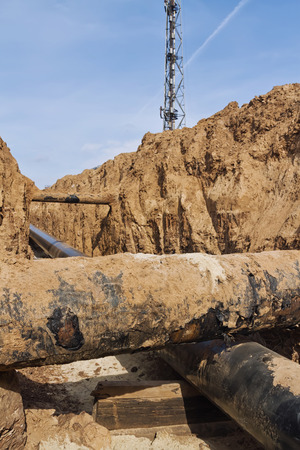 intersection of the projected pipeline with already existing inside the trench dugの写真素材