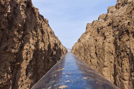pipeline is in the protective insulation laid on the bottom of the trench dugの写真素材