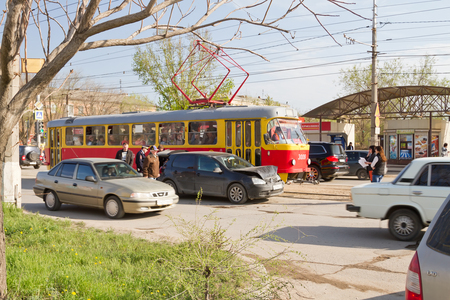 VOLGOGRAD - April 19: car accident on the tram tracks prevents normal movement of urban electric transport. April 19, 2016 in Volgograd, Russia.のeditorial素材