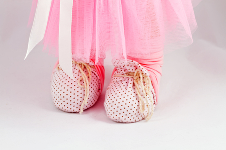 legs homemade boots handmade dolls with natural hair closeupの写真素材