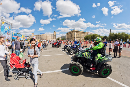 VOLGOGRAD - SEPTEMBER 10: Fans of extreme off-road driving Quad bikes demonstrate their and ammunition at the exhibition. September 10, 2016 in Volgograd, Russia.のeditorial素材