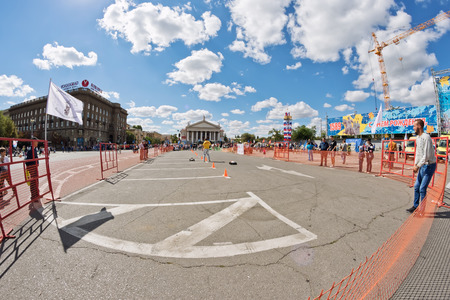 VOLGOGRAD - SEPTEMBER 10: race toy cars on the radio in a designated paddock on the station square under the open sky. September 10, 2016 in Volgograd, Russia.のeditorial素材
