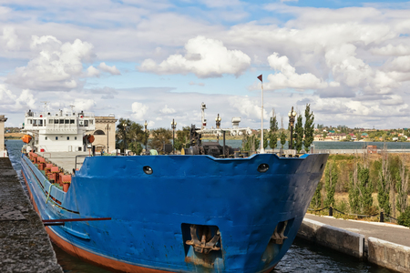 River barge for the carriage of goods is locking on navigable canalの写真素材