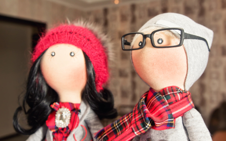 Handmade rag dolls with natural hair : a couple of hipsters in autumn clothesの写真素材
