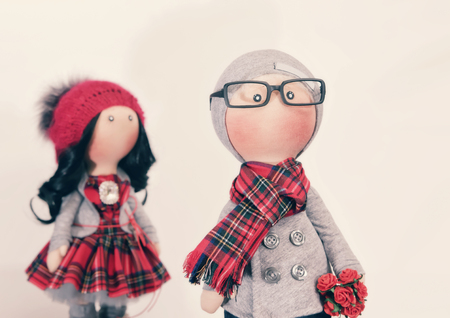 Handmade rag dolls with natural hair : a couple of hipsters in autumn clothesの写真素材