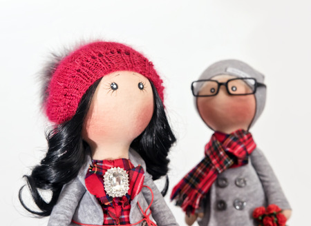 Handmade rag dolls with natural hair : a couple of hipsters in autumn clothesの写真素材