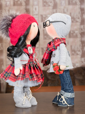 Handmade rag dolls with natural hair : a couple of hipsters in autumn clothesの写真素材