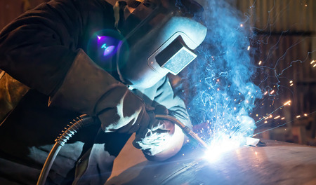Welding large diameter pipe in workshop conditions by the method of semi-automatic welding in shielding gasesの写真素材
