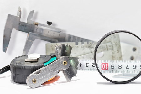 Templates for measuring the bevel edge during the preparation of the welded joints, measuring the height of the reinforcement bead and fillet weld leg are on the detail drawingの写真素材