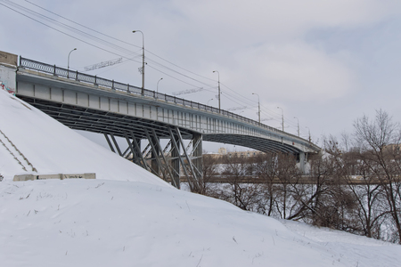 VOLGOGRAD - JANUARY 29: Highway bridge over the navigable Volga-don canal in the winter covered with snow. January 29, 2017 in Volgograd, Russia.のeditorial素材