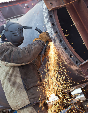 The welder handles the root seam with a cutting machine. Preparing for the facing seam to the...
