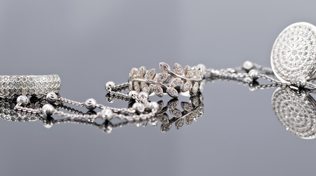 engagement silver ring with precious stones and fine silver chainの写真素材