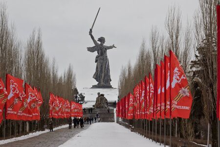 VOLGOGRAD - FEBRUARY 5: The memorial complex Mamaev Kurgan decorated with flags in honor of the anniversary of victory at Stalingrad. February 5, 2017 in Volgograd, Russia.のeditorial素材