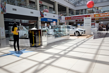 VOLGOGRAD, RUSSIA - APRIL 29:The interior of the shopping and entertainment complex KOMSOMALL with boutiques and sports shops. April 29, 2017  in Volgograd, Russia.のeditorial素材