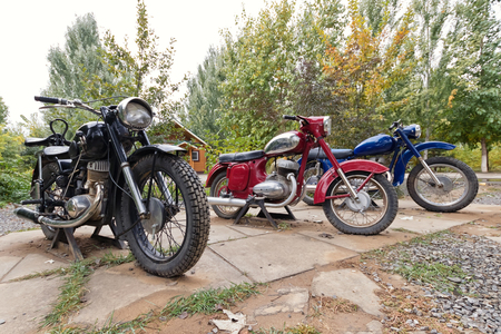 VOLGOGRAD - OCTOBER 15: Exhibition of old vintage motorcycles made in the USSR under the open sky. October 15, 2017 in Volgograd, Russiaのeditorial素材