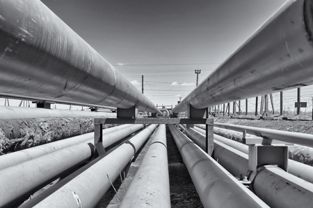 detail of steel light pipeline in oil refinery. Black and white photoの写真素材
