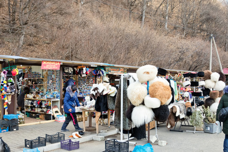 KARACHAY-CHERKESSIA, ARKHYZ- JANUARY 21: Souvenirs with images of attractions of Arkhyz in the shop local merchants. January 21, 2018 in Arkhyz, Russia.のeditorial素材