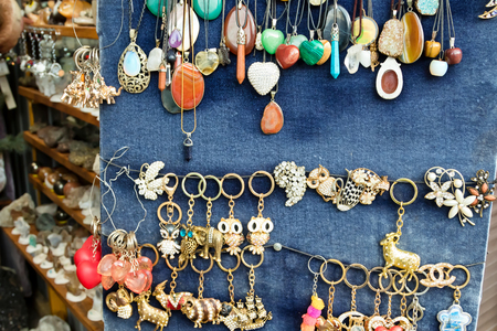 KARACHAY-CHERKESSIA, ARKHYZ- JANUARY 21: Souvenirs with images of attractions, and Arkhyz from stones in the shop local merchants. January 21, 2018 in Arkhyz, Russia.のeditorial素材