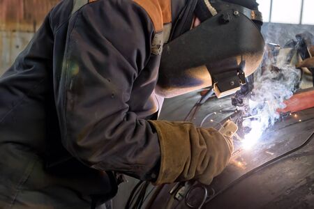 Manufacture of large diameter heat exchanger shell in the shop using manual arc weldingの写真素材